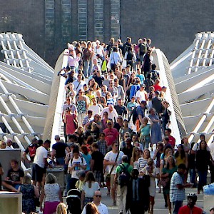 Crossing the Millennium Bridge
				(Photo by Mariano Mantel)