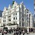 The Premier Inn London Leicester Square (the more modern building behind and to the right of the neogothic one), Premier Inn London Leicester Square, London (Photo courtesy of the hotel)