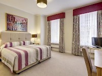 A bedroom in a flat at the Park Lane Apartments in Shaw House