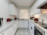 A kitchen in a flat at the Park Lane Apartments in Shaw House