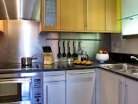 A full kitchen in a flat at Kings Wardrobe Apartments by BridgeStreet