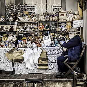 Market stallsâ€”like this one, selling English Bears on Portobello Road in Londonâ€”offer great authenticity and value
				(Photo by Claudio Accheri)