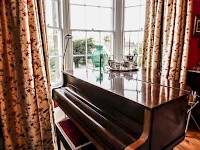 A piano at Grosvenor B&B